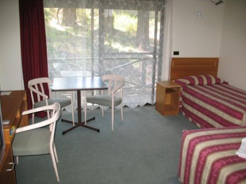 Country 2 Coast Motor Inn קופס הארבור חדר תמונה